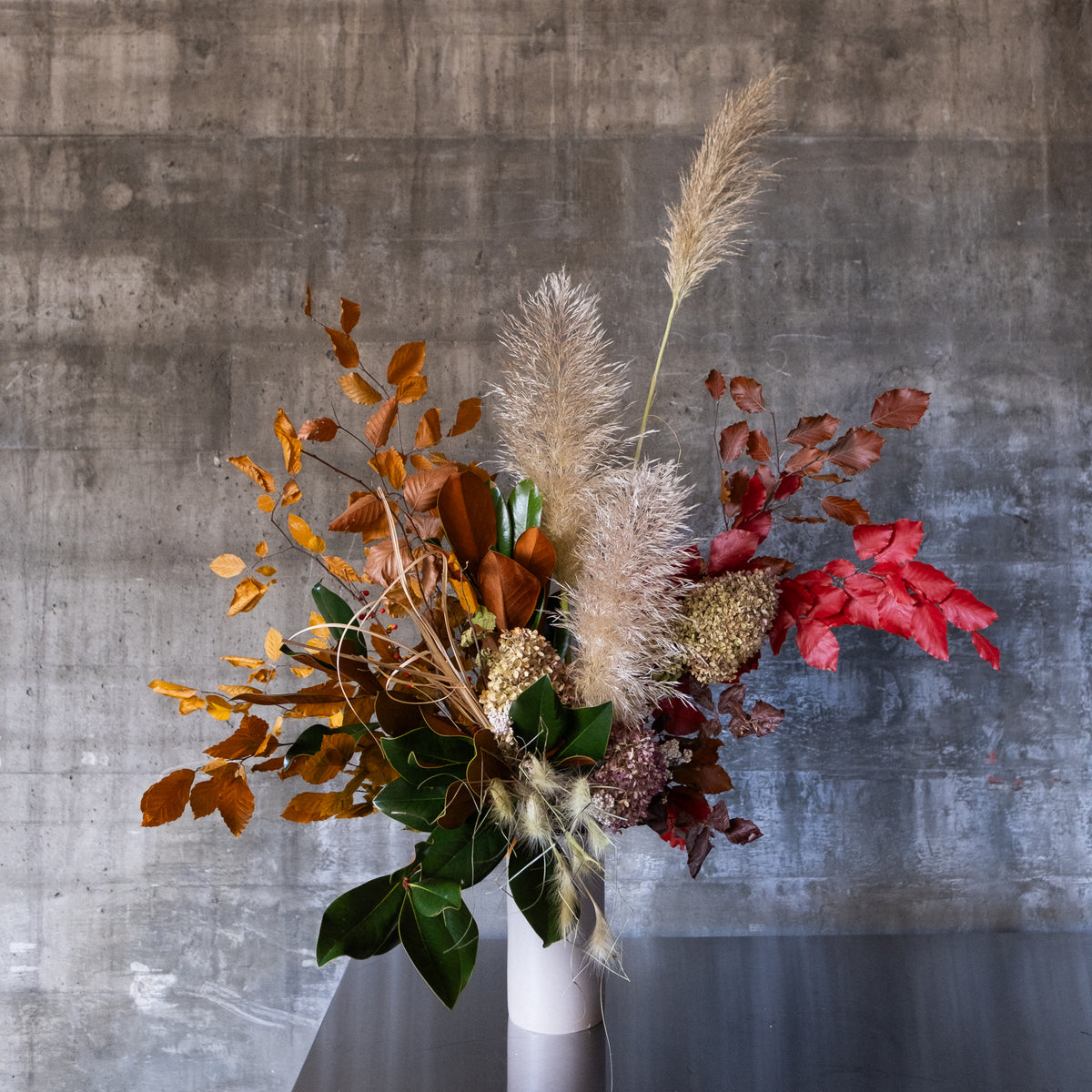 Flower delivery Boise. Large sculptural dried floral arrangement with autumn botanicals by Wildflower Floral Company